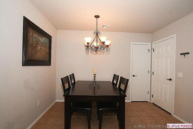 The adjoining breakfast nook is large with room fo