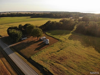 Aerial view of property's location featuring rural landscape