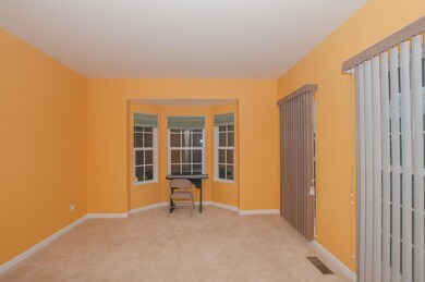 Formal living room, complete with a bay window! Could be a great office, study, or music room!