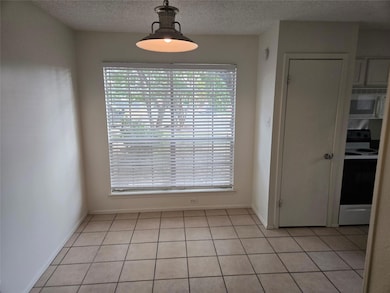 Unfurnished dining area featuring healthy amount 