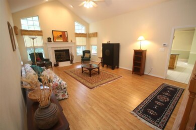 Foyer. Gas Fireplace. Opening to rt. is to kitchen