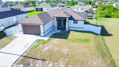 View of front of home with a garage, a residential