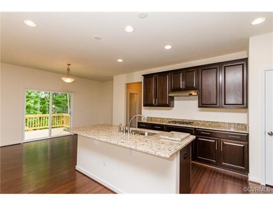 Gourmet Eat-in Kitchen with granite, hardwood floo