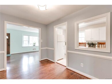 Dining area overlooking living room and open windo