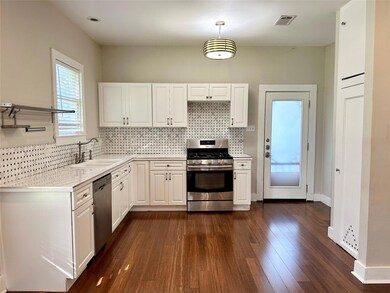 Kitchen with stainless steel appliances, light co
