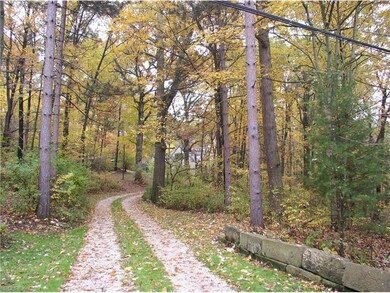 Lane coming into property with beautiful fall foll