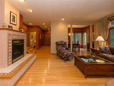 Large formal living room with gas fireplace.
