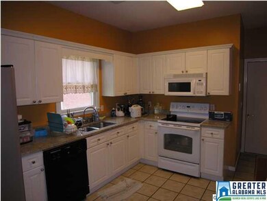Kitchen with new paint and granite counter tops