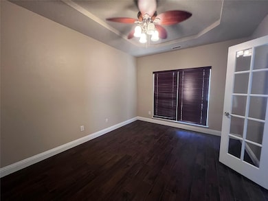 Office with wood-style floors