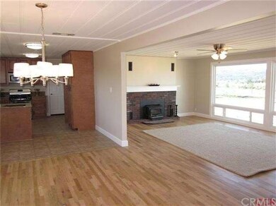 View from entry way, dining, kitchen and living ro