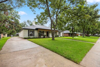 Spacious lot on a beautiful tree-line street.