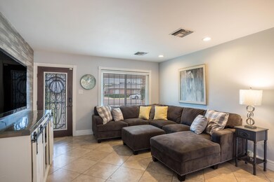 Living Room with Neighborhood Views