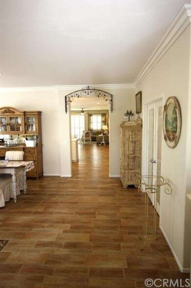 View from front door, thru to the kitchen and fami