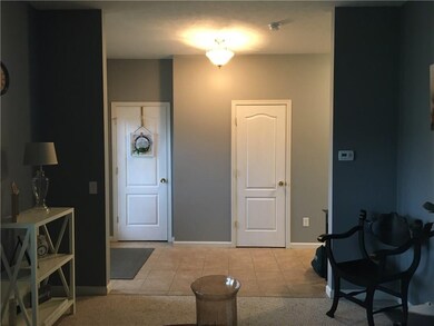 From front living room looking into foyer at close