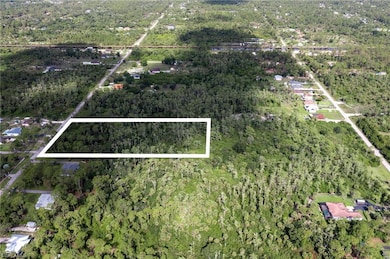 2543 12th Ave NE, Rural Estates, FL 34120 - photo 2