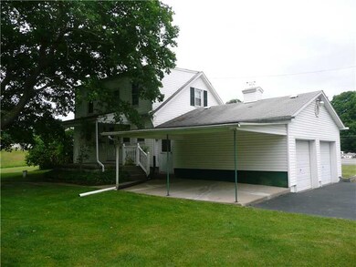 Exterior Back. GREAT YARD FOR SUMMERTIME PICNICS..