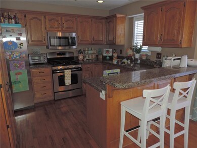 Kitchen with Granite and SS Appliances