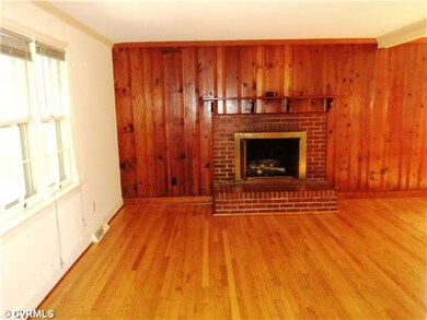 Living Room - Refinished Hardwoods and Gas Firepla