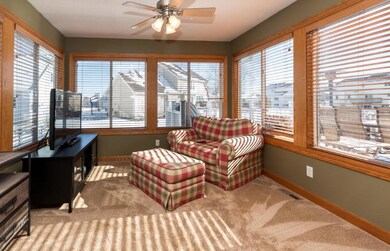 Sunny four season room off the kitchen - can see t