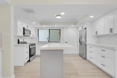 11457 Shady Oaks Ln, North Palm Beach, FL 33408 - photo 2