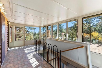 Sunroom looking into the entryway to the storage r