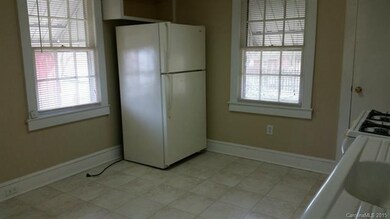 Kitchen; space for table and washer/dryer connecti