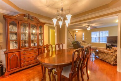 Adjacent to the family room is the dining room. Holds a large table for 6+ and a buffet.