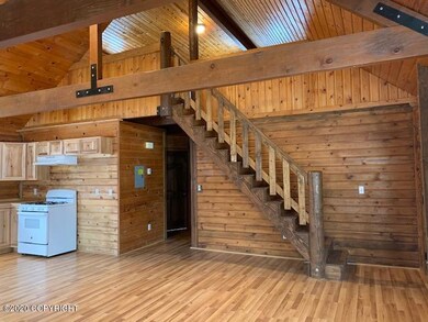 living area w/steps to the loft
