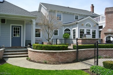 Beautiful backyard includes stamped-concrete patio & walks, outdoor BBQ & fireplace, brick gazebo with wet bar & in-ground pool.