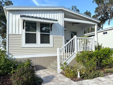12128 Grand Oak Ln, Wildwood, FL 34484 - photo 2