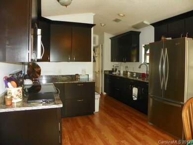 Kitchen with new granite counter tops, Stainless S