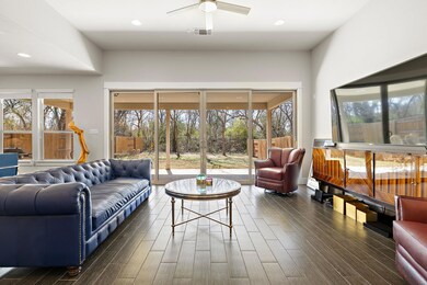 Living area featuring dark wood finished floors, 