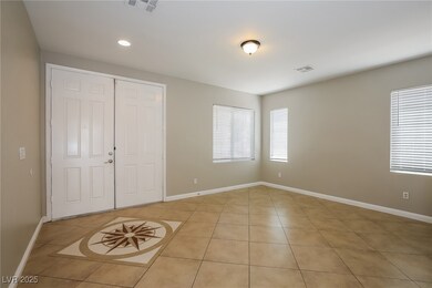 Unfurnished bedroom featuring light tile patterned