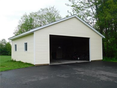 NEW DETACHED GARAGE WITH CEMENT FLOOR.  NEW BLACKT