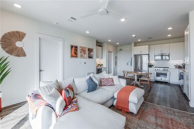 Living room facing toward the kitchen/dining