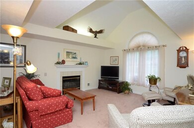 Vaulted great room, with gas fireplace
