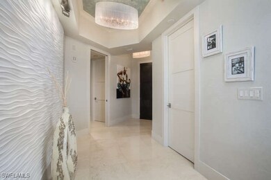 Hallway featuring baseboards