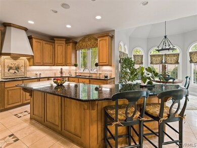Large center island with seating & storage. Opens