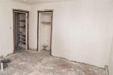 Unfurnished bedroom featuring a closet