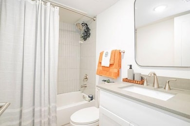 Full bathroom with shower / bath combination with 