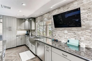 Stainless Steel Farm Sink by Garden Window and TV