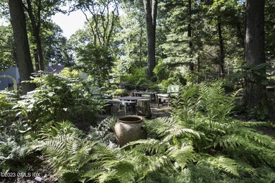 thumbnail_4. patio in shade of woods.