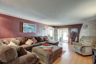 Living Room with Exit to Back Patio