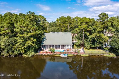 Aerial view of the lake side of the home