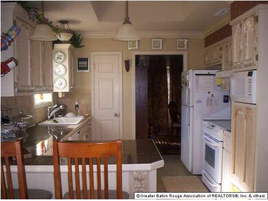 Great Kitchen features faux finished cabinets