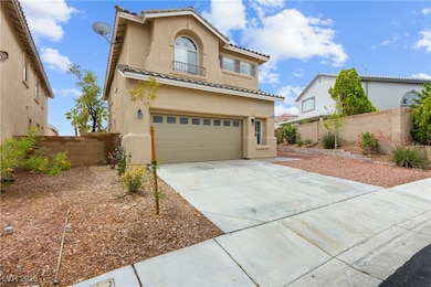 View of front of house with an attached garage, st