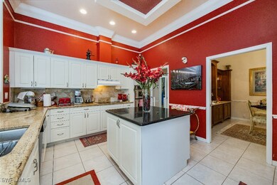 Kitchen with light tile patterned floors, a kitche