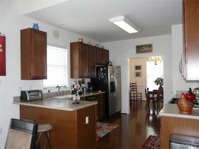 Nice size kitchen opens to dining room and eat in 