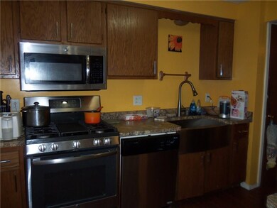 KITCHEN WITH UPDATED COUNTERS, FLOORING AND ENERGY