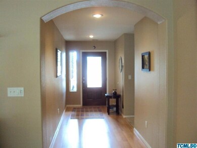 Arched and open foyer